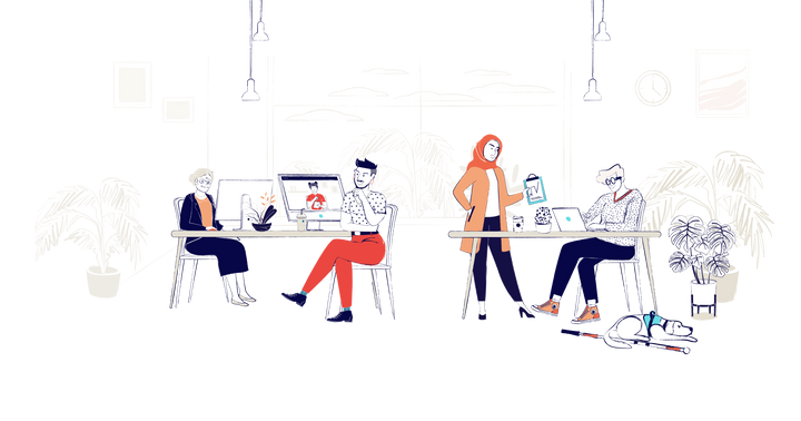 Four people in an office sitting around two desks. A service dog sits under one desk.