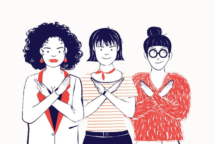 Three women stand next to each other with their arms crossed in an X